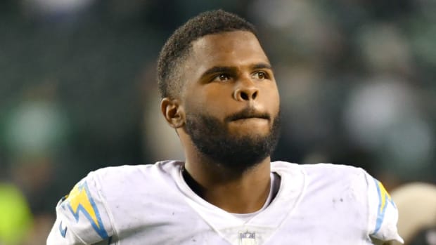Chargers defensive lineman Jerry Tillery walks off the field after a win in 2021.